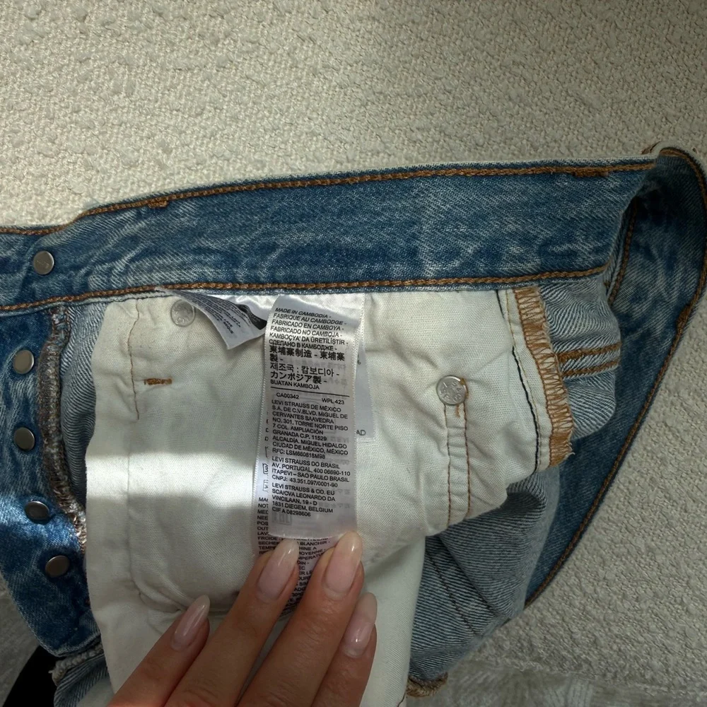 Levi's Light Blue Distressed Denim Cutoff Shorts - Picture 5 of 5